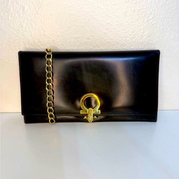 Salvatore Ferragamo Handbags - #70. Salvatore Ferragamo Black Leather Clutch with Gold Chain